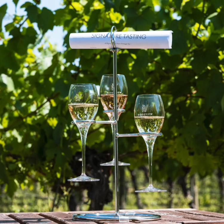 Ridgeview Tasting Flight of three wines with a scroll above it in a stand